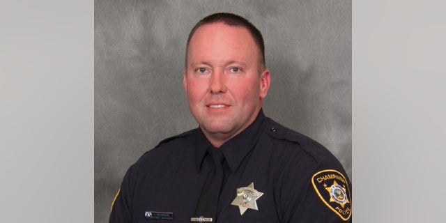 Champaign, Ill., Police Officer Chris Oberheim, 44, was killed Wednesday by a gunman while responding to a domestic disturbance call. 