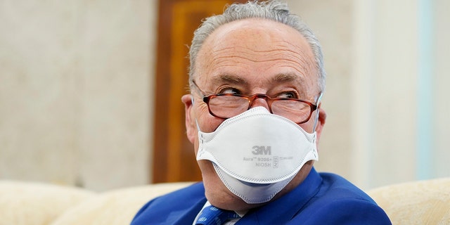 Senate Majority Leader Chuck Schumer, D-N.Y., attends a meeting with President Biden and congressional leaders in the Oval Office of the White House, Wednesday, May 12, 2021, in Washington. 