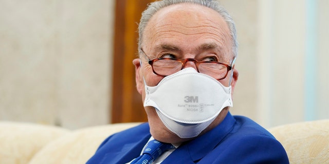 Senate Majority Leader Chuck Schumer of N.Y., attends a meeting with President Joe Biden and congressional leaders in the Oval Office of the White House, Wednesday, May 12, 2021, in Washington. 