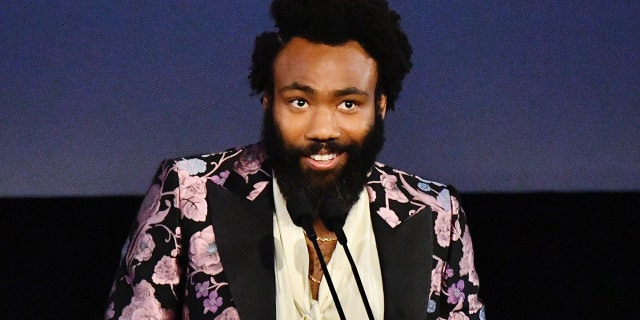Donald Glover, wearing Gucci, speaks onstage during the 2019 LACMA Art + Film Gala Presented By Gucci at LACMA on November 02, 2019, in Los Angeles, California.