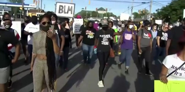 BLM protesters march through Elizabeth City Tuesday.