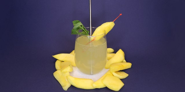 The Hawaii Mango Mint French 75 is mixed with pickled mangos, mint, gin, sugar and prosecco. (Cortney Moore/Fox News)