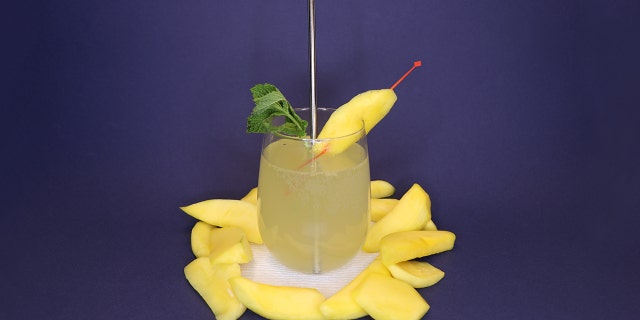 The Hawaii Mango Mint French 75 is mixed with pickled mangos, mint, gin, sugar and prosecco. (Cortney Moore/Fox News)