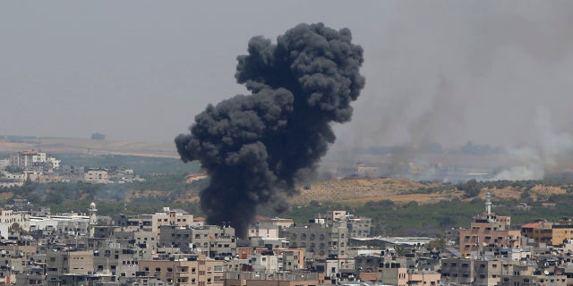 Smoke rises after an Israeli airstrike in Gaza in Gaza City on Tuesday. (AP)