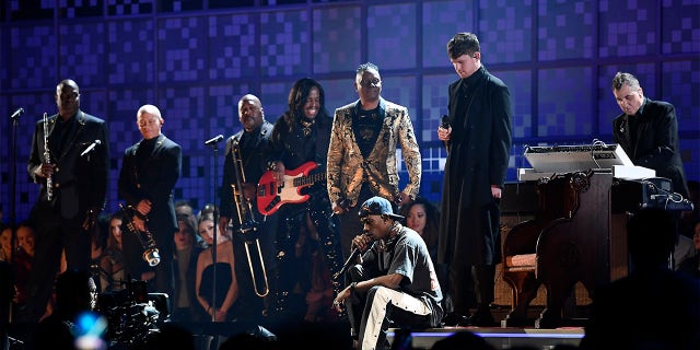 (L-R) Verdine White and Philip Bailey of Earth, Wind & Fire perform with Travis Scott and James Blake onstage during the 61st Annual GRAMMY Awards at Staples Center on February 10, 2019, in Los Angeles, California.