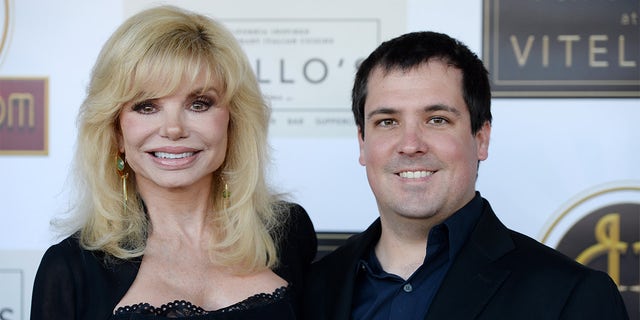 Loni Anderson and her son Quinton Anderson Reynolds arrive at the debut of the Southern California location of Michael Feinstein's new supper club Feinstein's at Vitello's on June 13, 2019, in Studio City, California. 