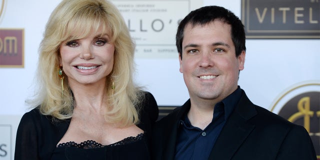 Loni Anderson and her son Quinton Anderson Reynolds arrive at the debut of the Southern California location of Michael Feinstein's new supper club Feinstein's at Vitello's on June 13, 2019, in Studio City, California. 