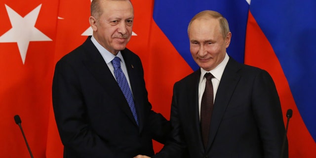 MOSCOW, RUSSIA - MARCH 05:  Russian President Vladimir Putin and Turkish President Recep Tayyip Erdogan shake hands during their talks at the Kremlin on March 5, 2020 in Moscow, Russia. Erdogan is having a one day visit to Russia to discuss the war conflcit in Syria. (Photo by Mikhail Svetlov/Getty Images)