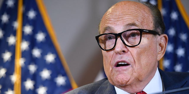 Trump's personal lawyer Rudy Giuliani speaks during a press conference at the Republican National Committee headquarters in Washington, DC, on November 19, 2020. Unlike Tuesday’s dramatic hearing with Republican state officials saying Trump and Rudy Giuliani repeatedly pressed them to violate their oath of office, this one felt like a rehash.