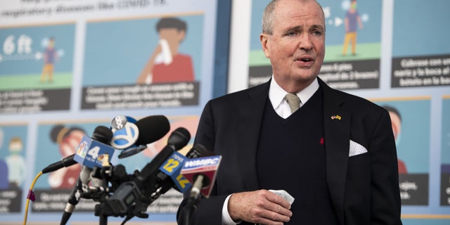 Phil Murphy, New Jersey's governor, speaks at a news conference after touring the New Jersey Convention and Exposition Center Covid-19 vaccination site in Edison, New Jersey, U.S., on Friday, Jan. 15, 2021. New Jersey will expand Covid-19 vaccinations to people 65 years old and over and those ages 16 to 64 who have