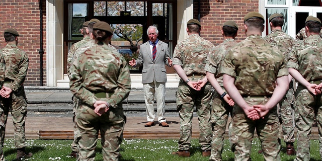 Prince Charles, Prince of Wales addresses soldiers of the Welsh Guards during a visit to Combermere Barracks on May 5, 2021, in Windsor, England. 