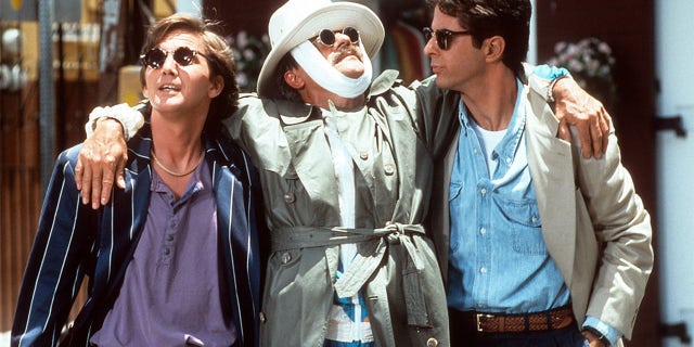 Andrew McCarthy, Terry Kiser and Jonathan Silverman hang out in a scene from the film 'Weekend At Bernie's II', 1993.