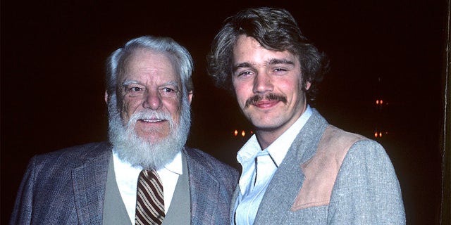 Actor Denver Pyle and actor John Schneider attend the John Wayne Cancer Clinic's Bellamy Scene Beautiful People Awards on March 28, 1982, at the SmokeHouse Restaurant in Burbank, California. 