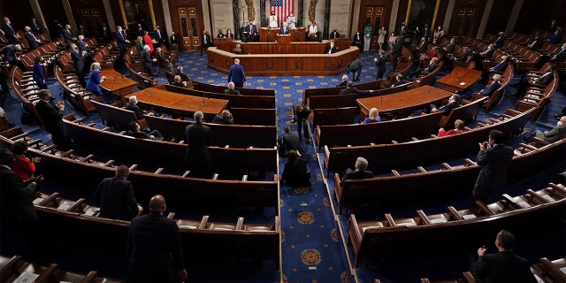 President Biden speaks to a joint session of Congress Wednesday, April 28, 2021, in the House Chamber at the U.S. Capitol in Washington, as Vice President Kamala Harris and House Speaker Nancy Pelosi of California watch. (Doug Mills/The New York Times via AP, Pool)