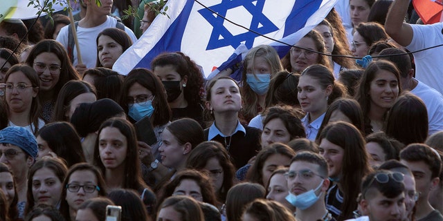 Israelis participate in a rally calling for the release of Israeli soldiers and civilians being held by Hamas in Gaza, In front of the Prime Minister's office in Jerusalem, Wednesday, May 19, 2021. (AP Photo/Sebastian Scheiner)