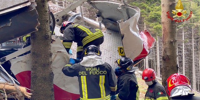 Transport Minister Enrico Giovannini visited the site Monday and announced a commission of inquiry to investigate the "technical and organizational causes" of the accident. (AP/Vigili del Fuoco Firefighters)