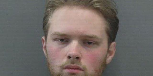 Joseph Thomas Ness, 21, was taken into custody without incident.