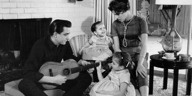 Johnny Cash with his first wife Vivian Liberto and daughters, Rosanne Cash and Kathy Cash 1957. (Photo by Michael Ochs Archives/Getty Images)