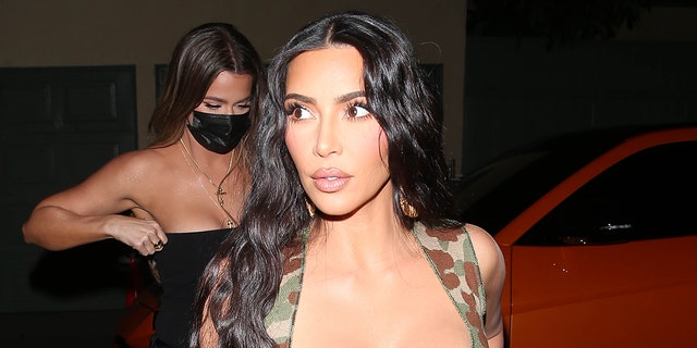 Kim Kardashian removed a portion of her mobile game that seemingly referenced Meghan Markle and Prince Harry.
