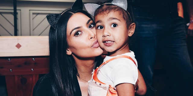 Kim Kardashian and her daughter, North West. (Photo by Rich Fury/Forum Photos via Getty Images)