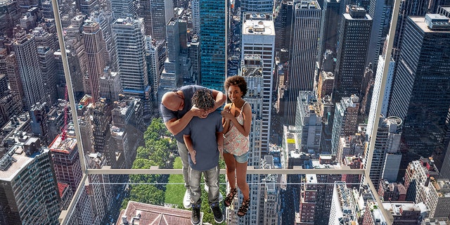 The see-through human dumbwaiter, called Ascent, will take riders up to 1,210 feet above the city, where they can gaze down upon Madison Avenue.