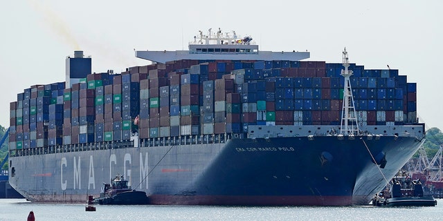 The CMA CGM Marco Polo makes it way toward the Elizabeth-Port Authority Marine Terminal as seen from Bayonne, N.J., Thursday, May 20, 2021. (AP Photo/Seth Wenig)