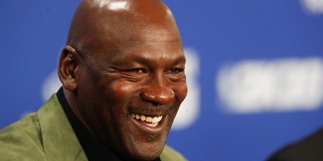 FILE- In questo Jan. 24, 2020, file di foto, former basketball superstar Michael Jordan speaks during a press conference ahead of NBA basketball game between Charlotte Hornets and Milwaukee Bucks in Paris.