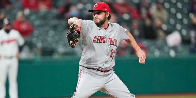 Cincinnati Reds open pitcher Wade Miley delivers the sixth inning of the baseball game against the Cleveland Indians on Friday, May 7, 2021 in Cleveland.  (Associated Press)