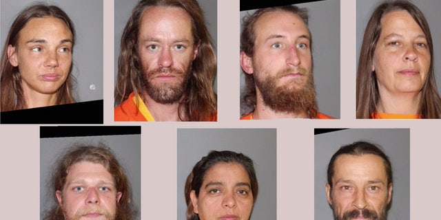 The seven people who have been charged in connection with the discovery of a mummified body. 