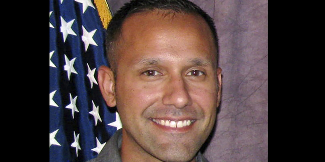A man charged with killing 10 people at a Colorado supermarket surrendered after being shot by Boulder Police Officer Richard Steidell, shown here, who waited for him to come into view down a store aisle, according to new information about the shooting released Thursday. (AP)