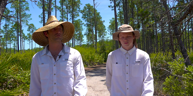 David Bulger (left) walking alongside Justin Moore through the Panama City Beach Conservation Park (Robert Sherman, Fox News). 