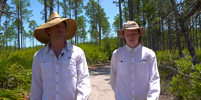 David Bulger (left) walking alongside Justin Moore through the Panama City Beach Conservation Park (Robert Sherman, Fox News).