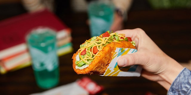 The Naked Chicken Chalupa was first introduced by Taco Bell in 2017 and is returning to menus on Thursday as the fast food chain’s entrance to the "chicken sandwich wars."