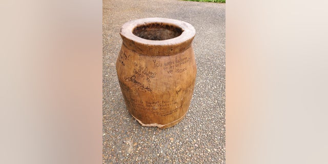 The antique barrel, signed by the emergency workers who rescued young Dorian.