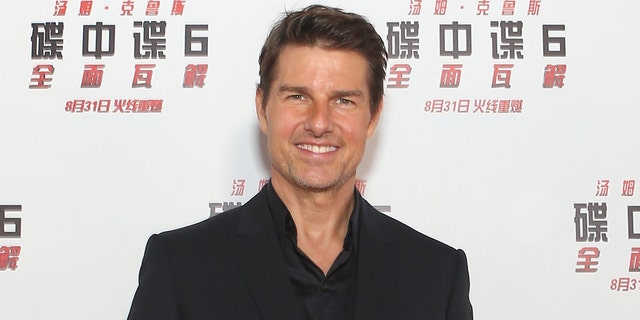 Tom Cruise attends a movie premiere in China