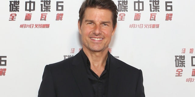 Tom Cruise attends a movie premiere in China