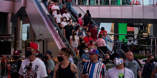April 24, 2021: Las Vegas is bustling again after casino capacity limits were raised Saturday, May 1, to 80% and person-to-person distancing dropped to 3 feet (0.9 meters). 