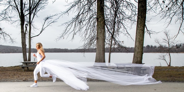 Vanessa Reiser is running 285 miles across the state of New York in 12 days while wearing her wedding dress and other bridal-inspired athletic attire to bring awareness to narcissistic domestic abuse.