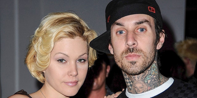  TV personality Shanna Moakler and musician Travis Barker attend the Grammy-nominated artist exhibition: The Worlds on Fire at Pacific Electric Lofts on February 2, 2009 in Los Angeles, California.  