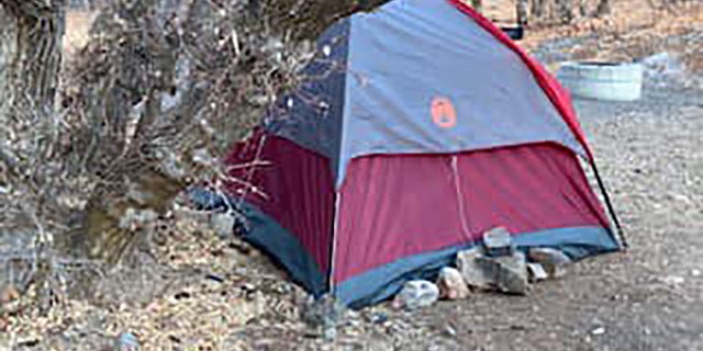 Officials came across what appeared to be an abandoned tent on Sunday during their renewed search for signs of the woman.