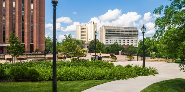 A view across the outside courtyard of the W.E.B Dubois library toward the Campus Center Hotel on the campus of the University of Massachusetts in Amherst, Massachusetts, a public institution.
