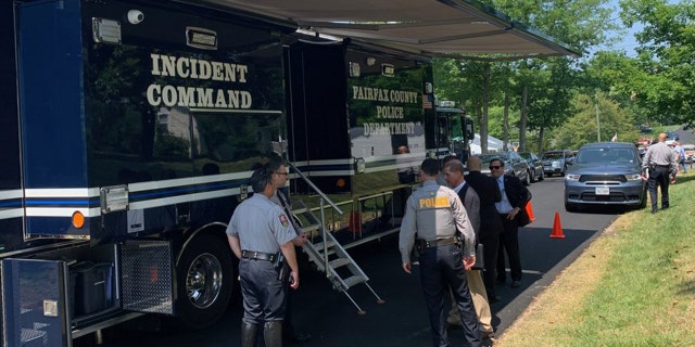 Investigators gather at the scene of Wednesday's double murder in Springfield, Virginia. (Fairfax County Police)