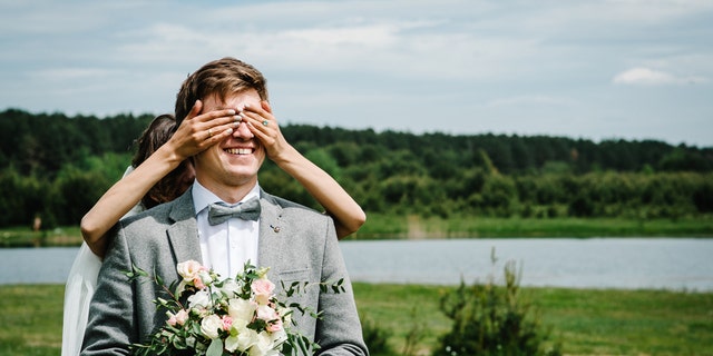 A groom was in for quite a shock on his wedding day when his best man pretended to be his bride during the first look. (iStock)