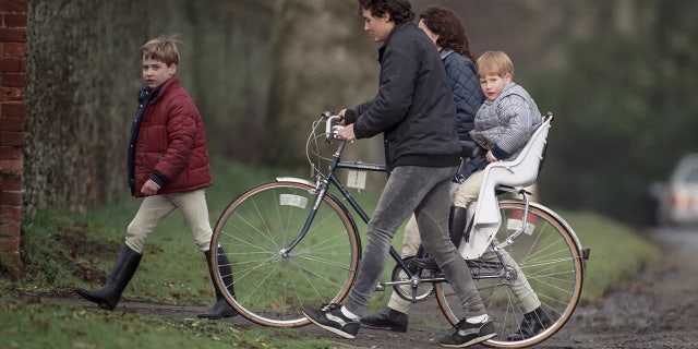 Prince William, and Prince Harry return to Sandringham Estate, in Norfolk, with Royal helpers, after their morning pony ride, on January 2, 1990 in Sandringham, United Kingdom.