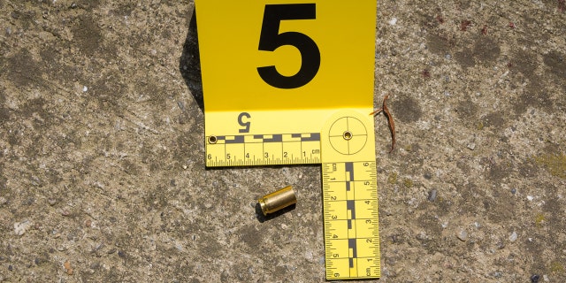 Bullet shell marker on the ground