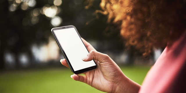 woman using her smartphone