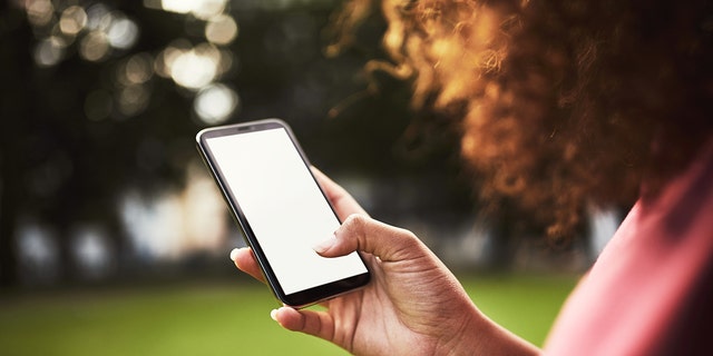 A woman using her smartphone