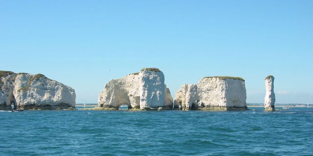 A tourist reportedly fell 120 feet off the Old Harry Rocks in Dorset, England, while the tide was in.