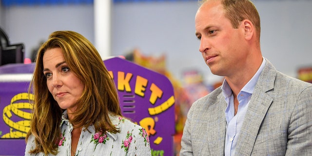 Prince William, Duke of Cambridge and Catherine, Duchess of Cambridge at Island Leisure Amusement Arcade, where Gavin and Stacey was filmed, during their visit to Barry Island, South Wales, to speak to local business owners about the impact of COVID-19 on the tourism sector on August 5, 2020 in Barry, Wales. 