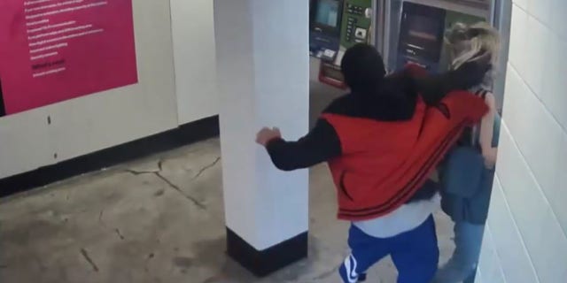 The woman was attacked from behind and robbed just before 6 p.m. Sunday.